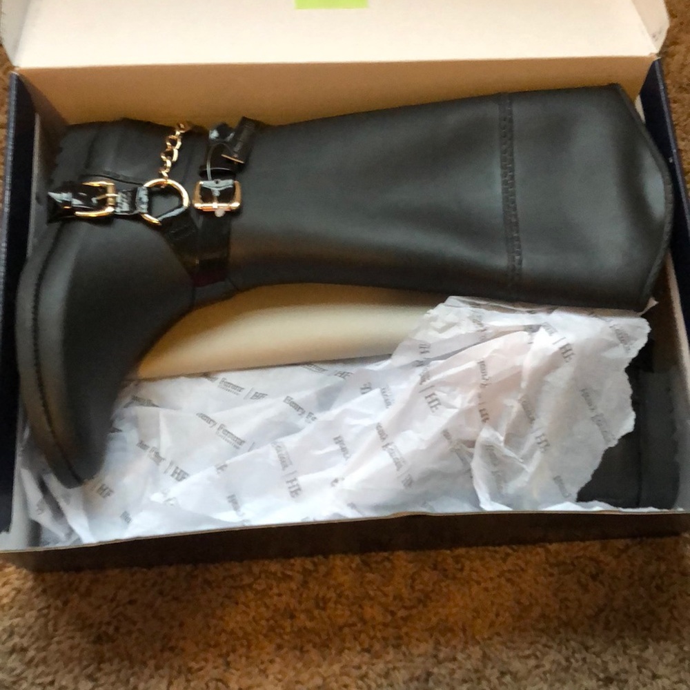 Black rain boots with buckle and gold hardware